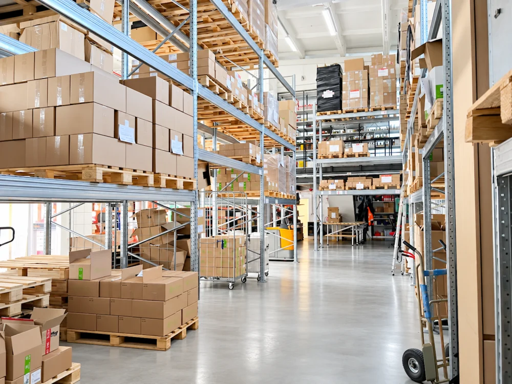 Shelving and an aisle in the FITONORDIC LAB warehouse